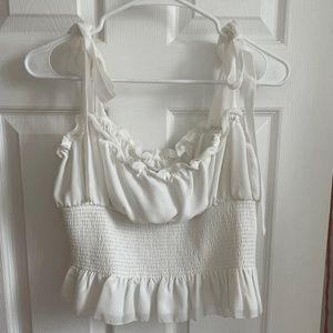 Brand New w tags Aritzia Women’s silky blouse. Size Large